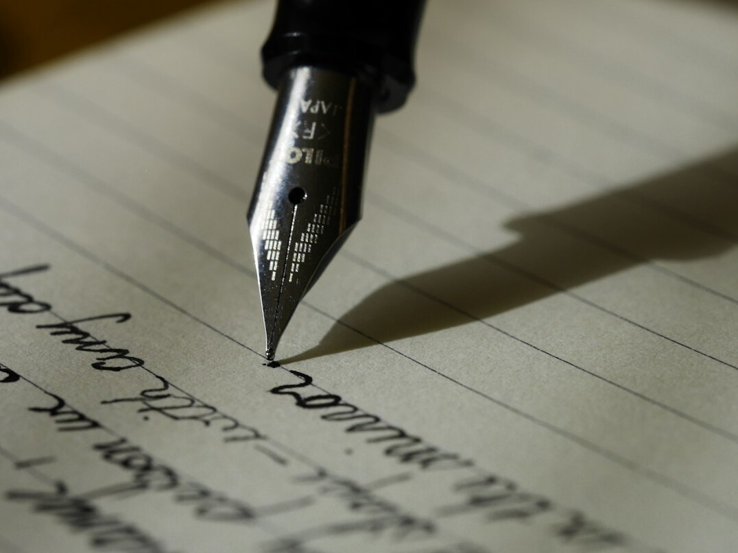 writer editing manuscript