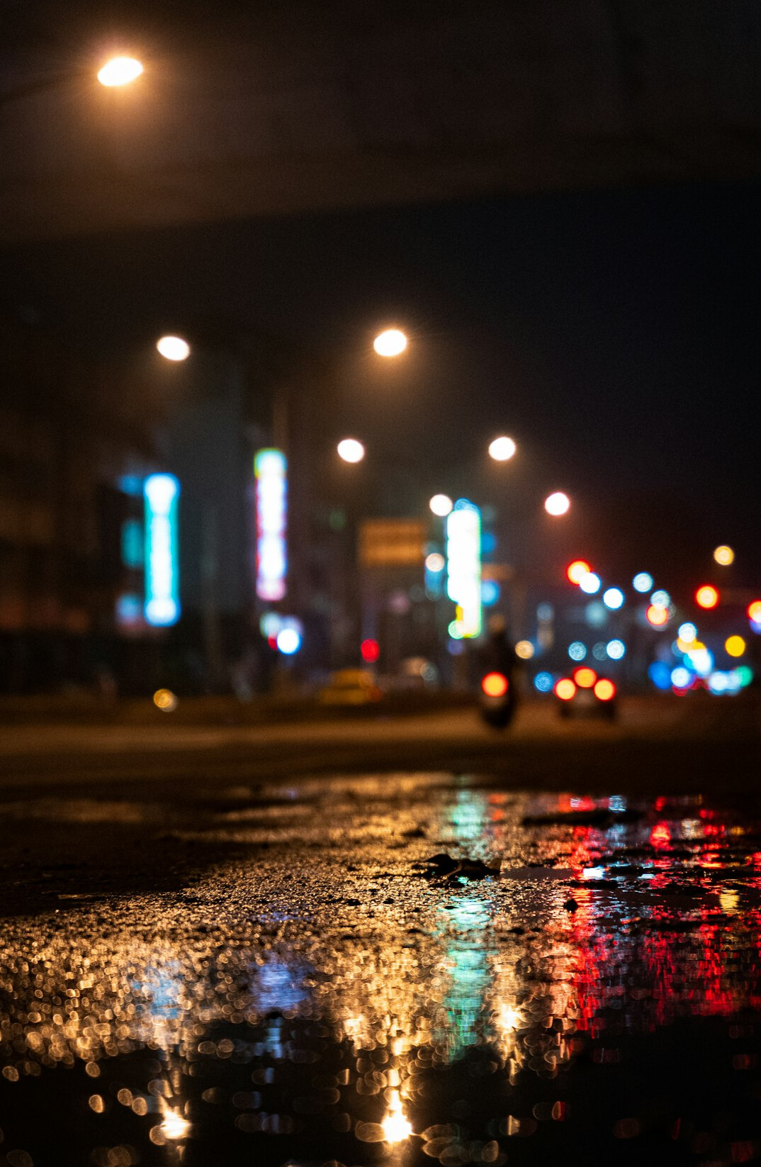 rainy city street at night