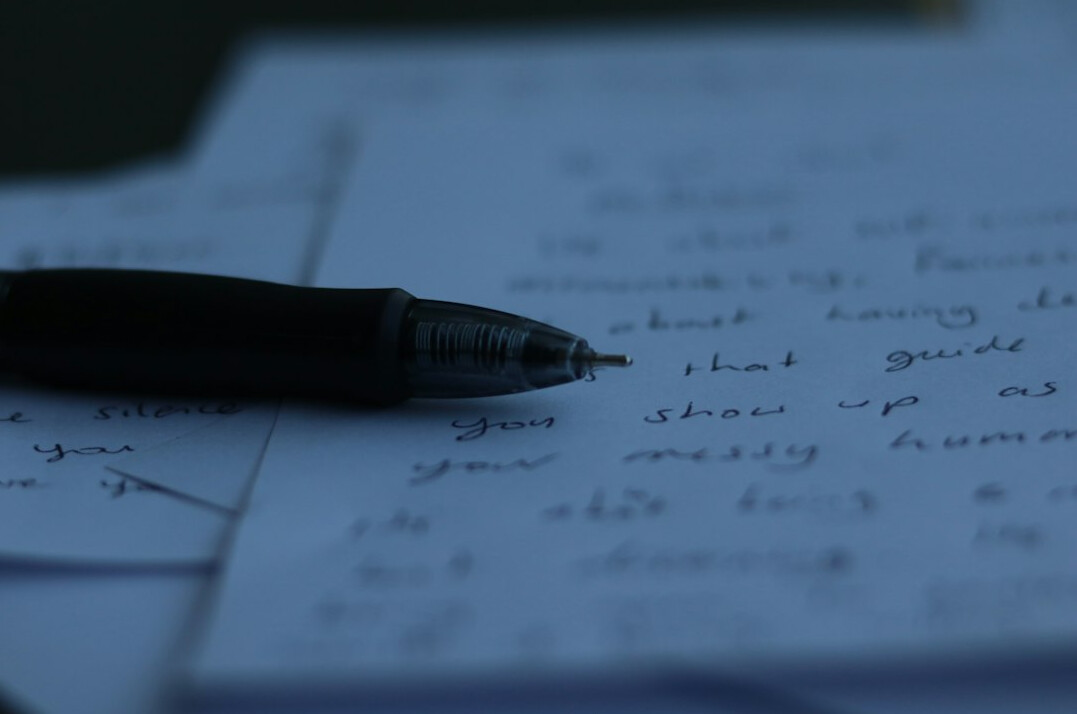 writer planning thriller plot on paper
